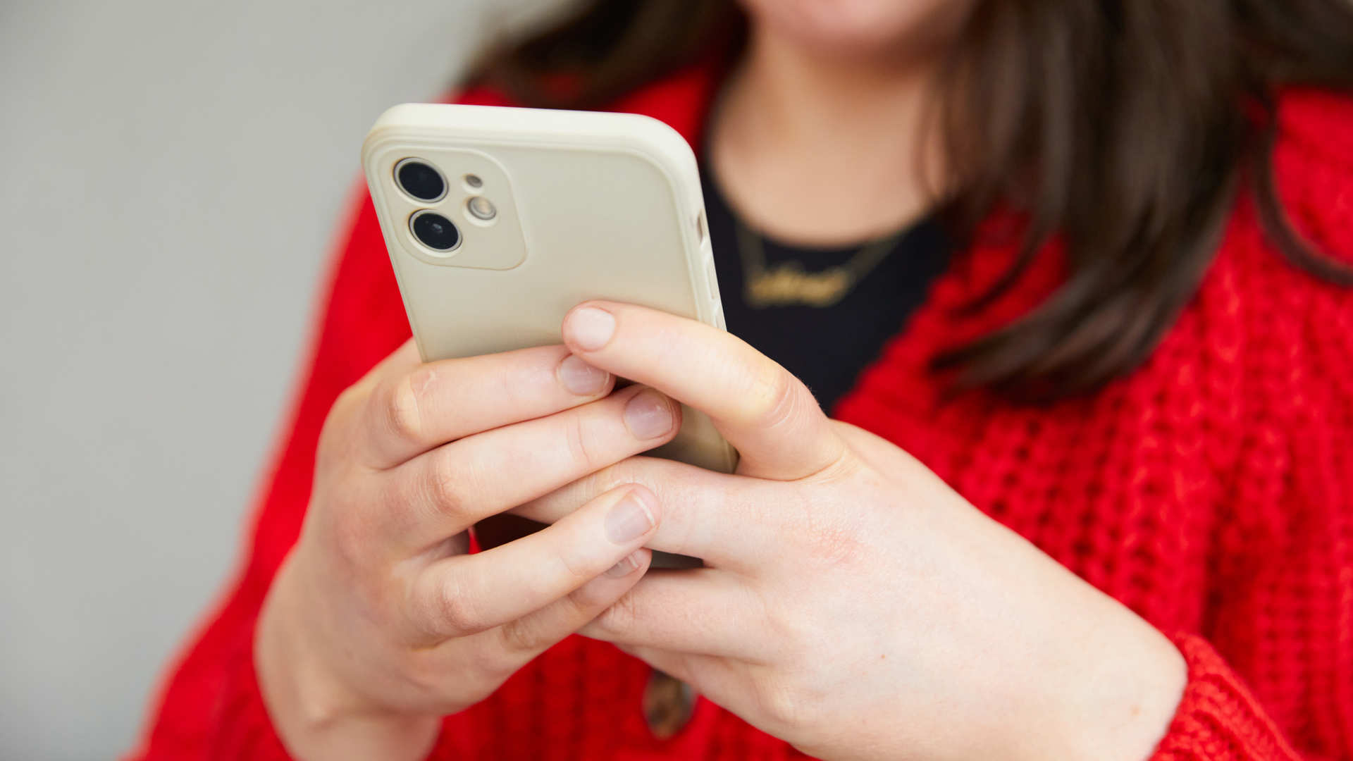 Client holding phone