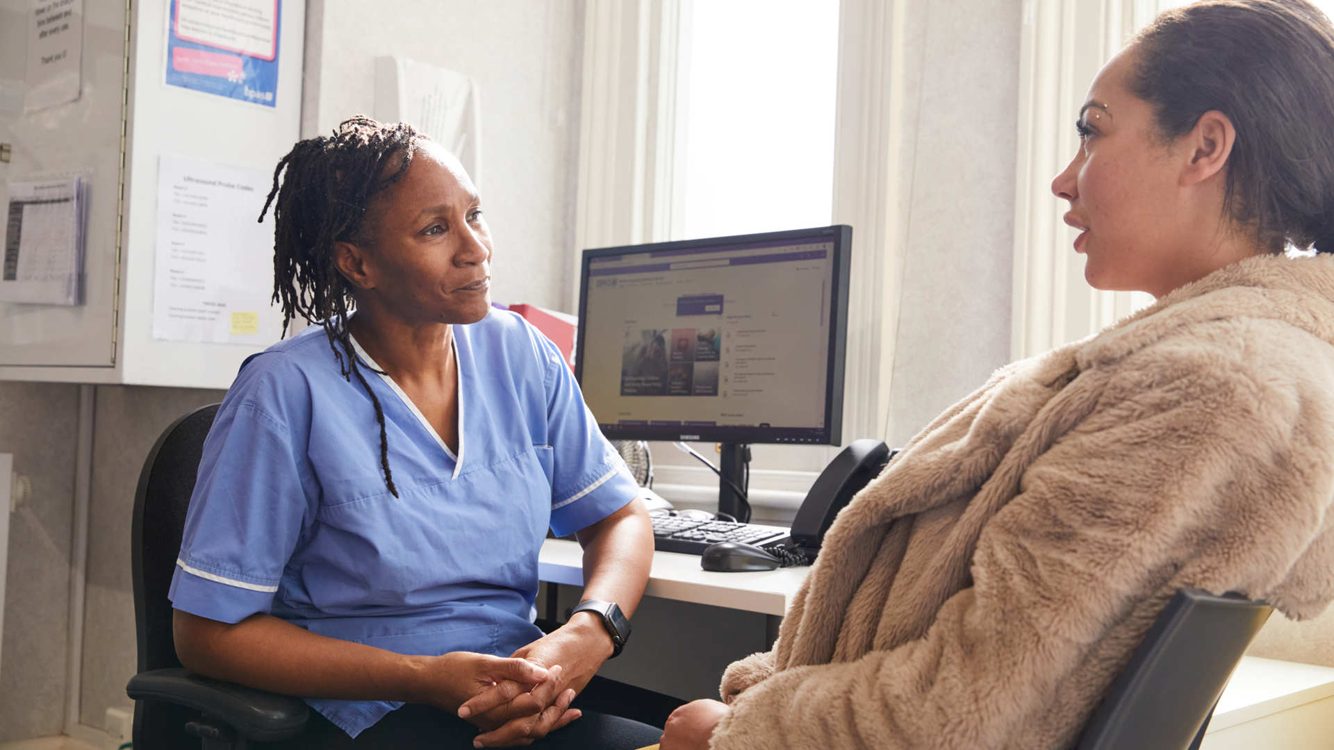 Nurse talking to client