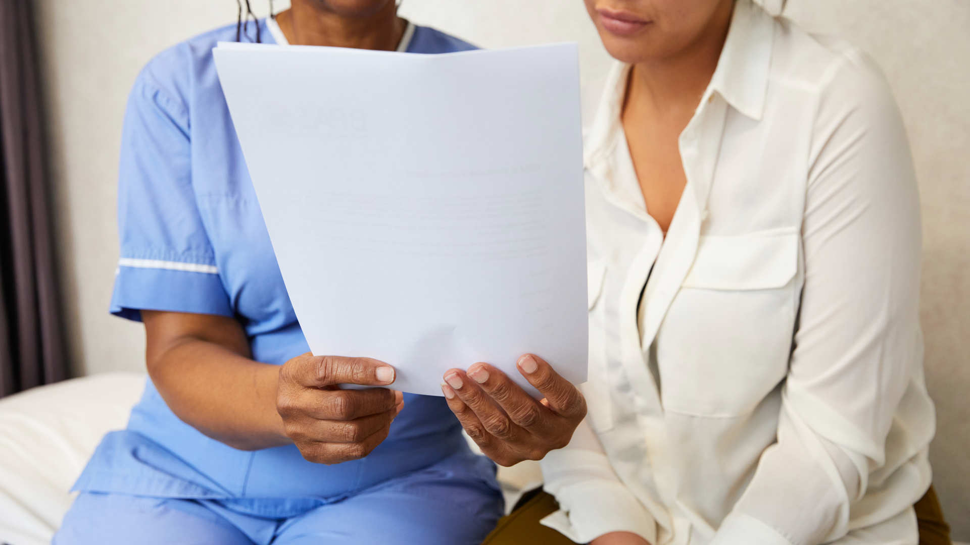 Nurse talking to client